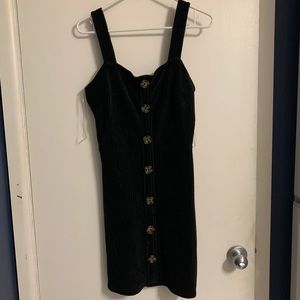 Black dress with buttons down the center